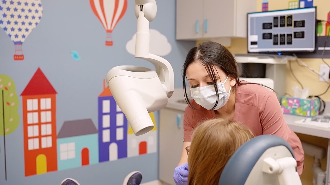 Assistant Taking X Rays